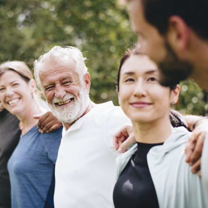 Happy diverse people together in the park