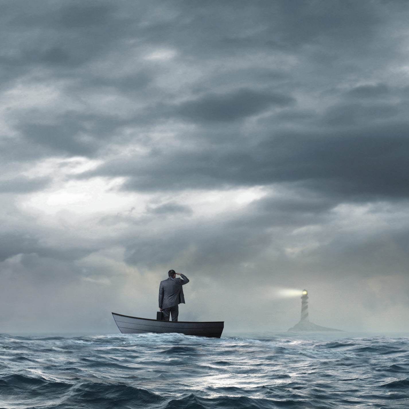 Businessman Looks At Lighthouse While Stranded On Boat